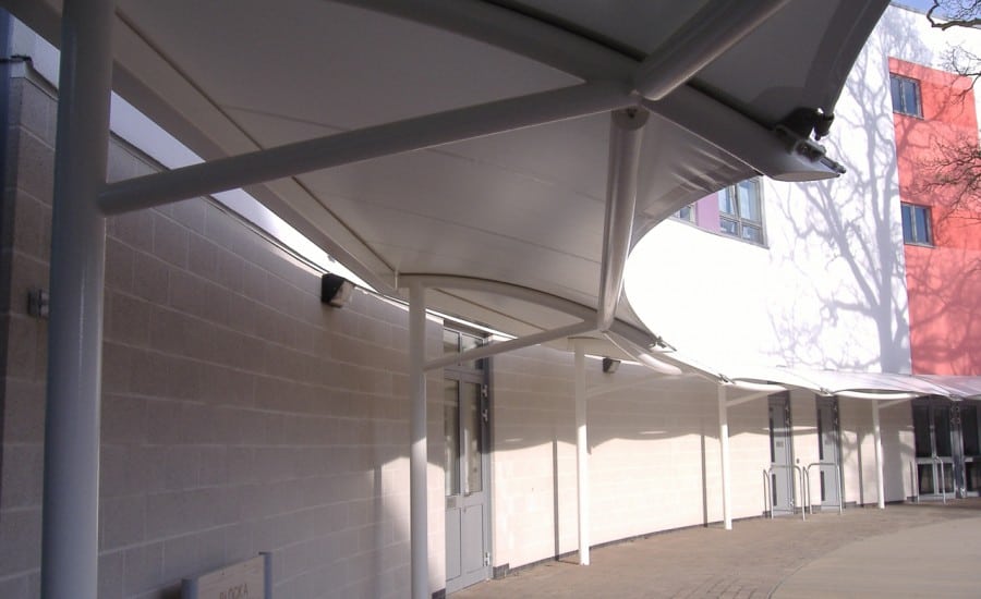 Fabric walkway canopies