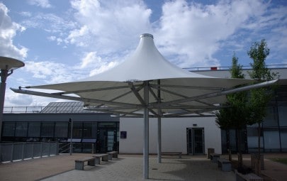 Canopies covering outdoor classroom space